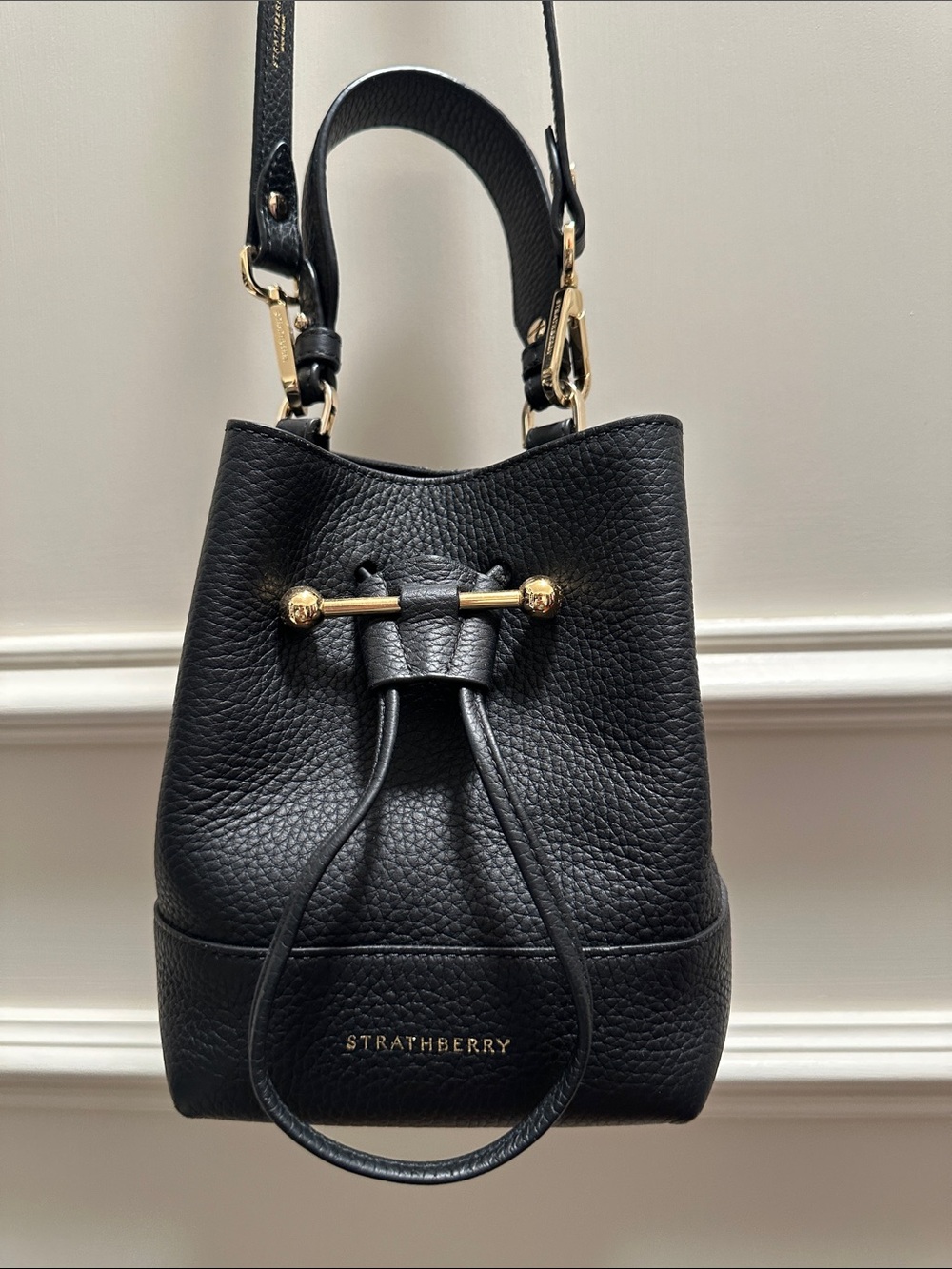 Strathberry Black Pebbled Leather Drawstring Crossbody with Gold Hardware